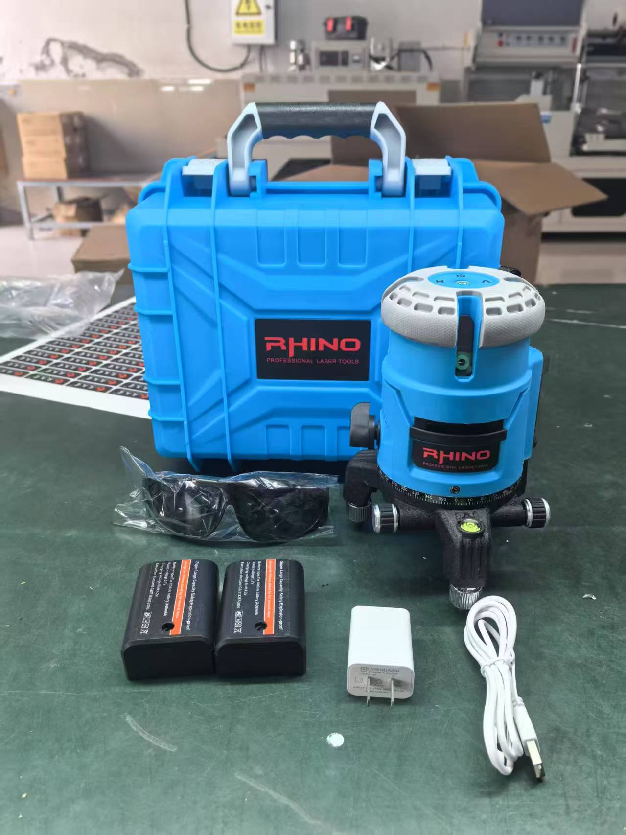 Máy laser 5 tia xanh RHINO TRÒN siêu sáng RH-004 Hộp nhựa xanh_10C/T